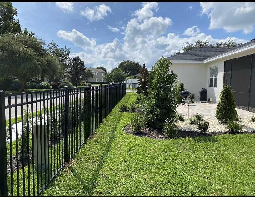 Black aluminum ornamental fence residential yard
