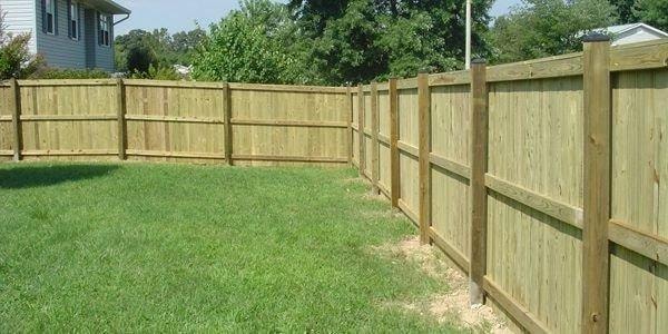 Commercial wood fence installation