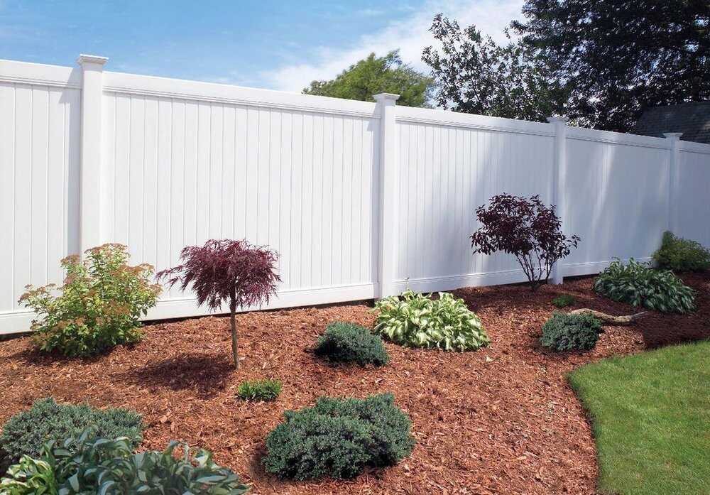 White vinyl privacy fence installation